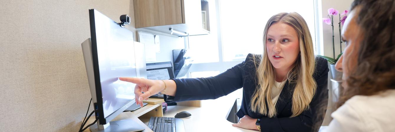 Genetic Counselor meeting with patient